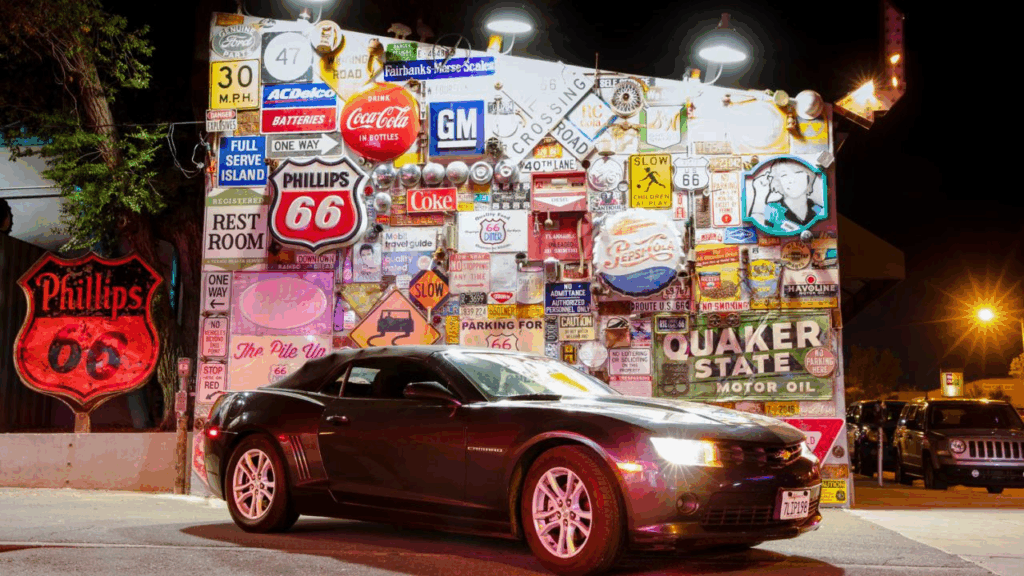 Brightly lit Old Route 66 signs guiding drivers through Albuquerque, New Mexico